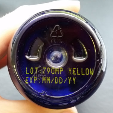 blue bottle base with yellow ink