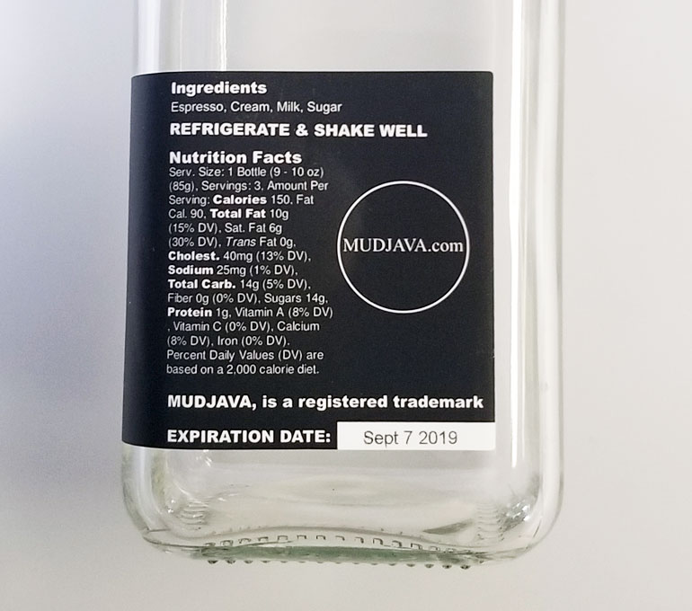 label with expiration date on glass bottle