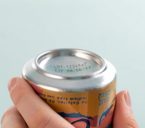 Metal can with lot number and expiration date