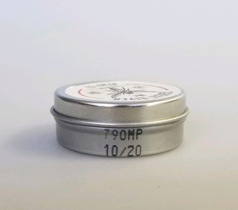 silver tin can with 790MP and date