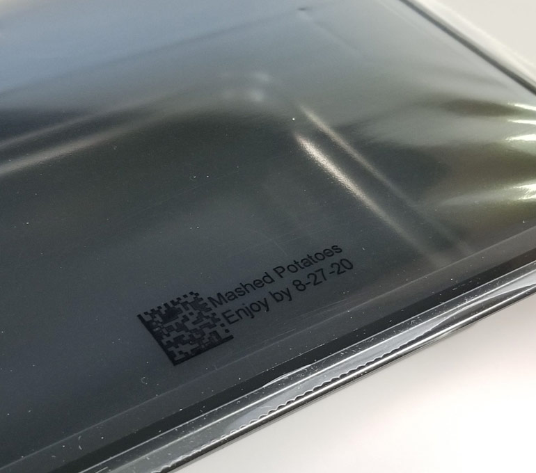 plastic food container with QR code and best by date