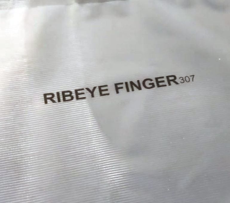 Ribeye Finger imprint on plastic food container