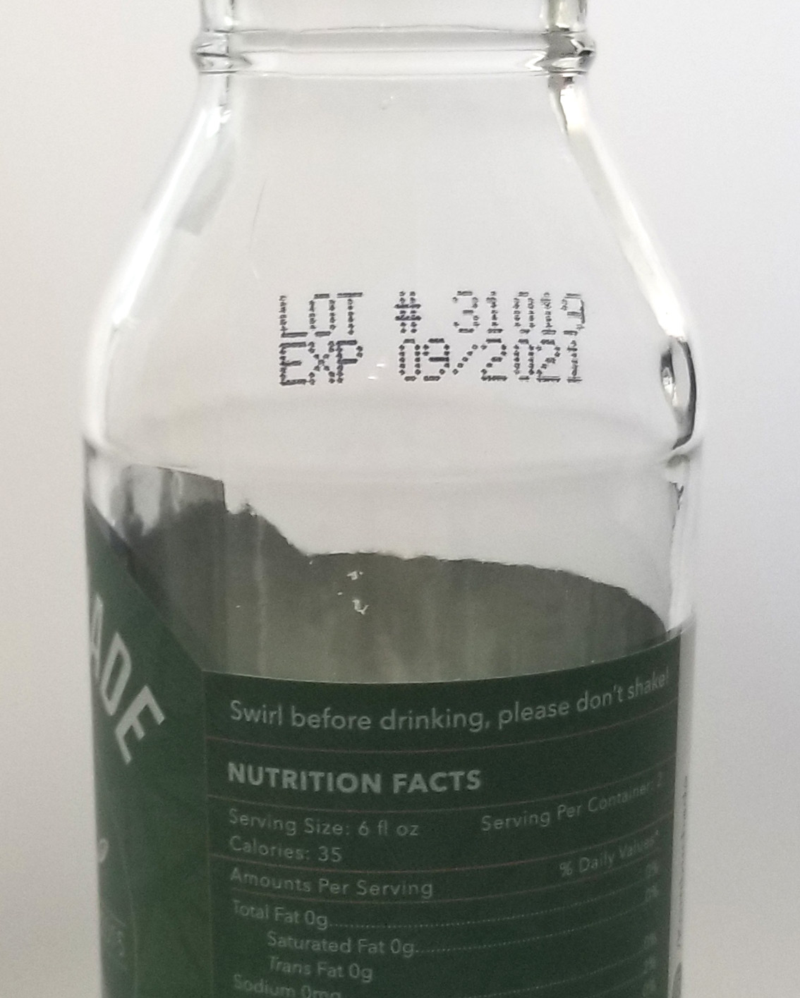 Code printed on a glass bottle